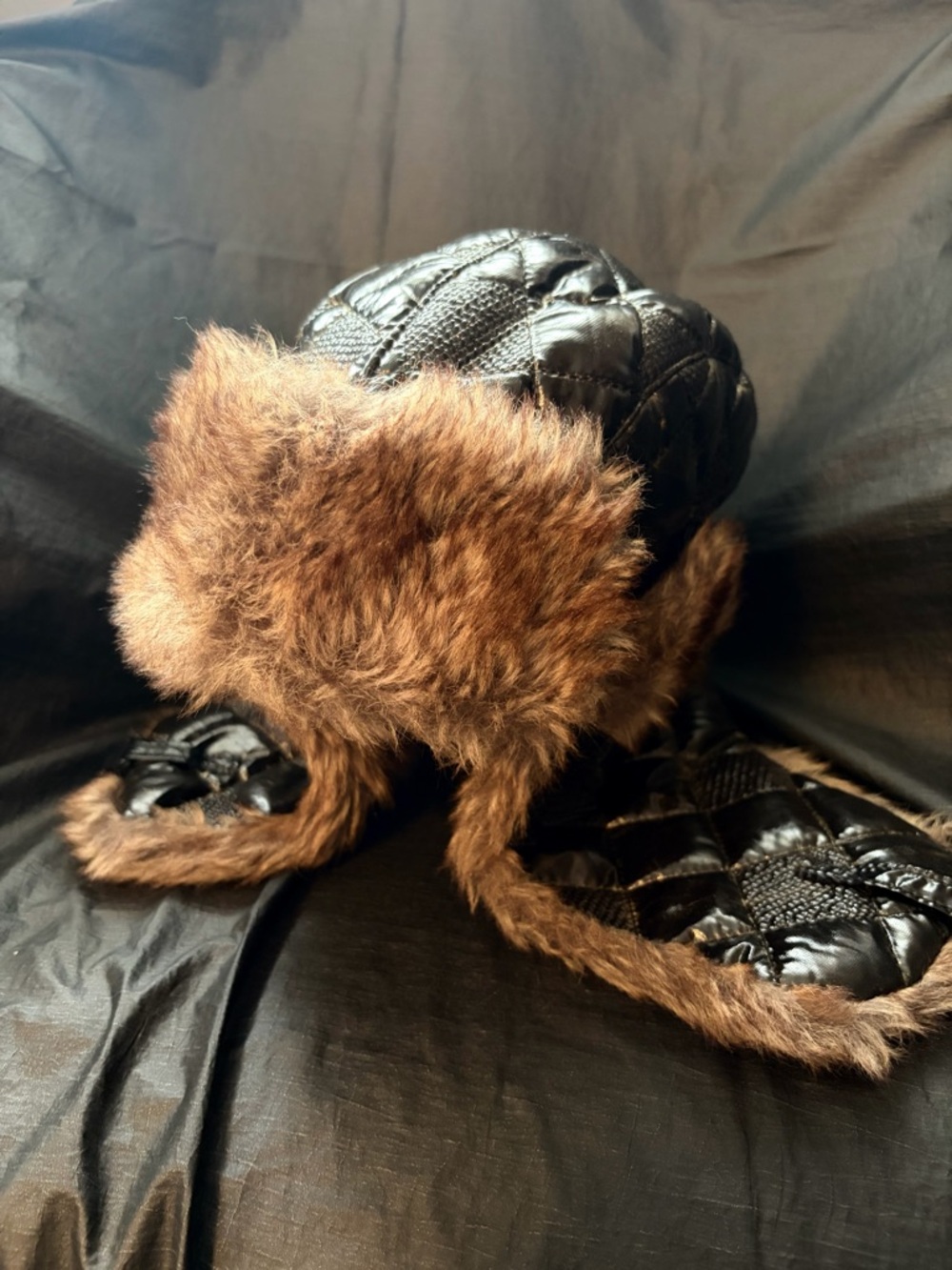 Quilted Black Faux-Leather Trapper Hat with Brown Faux-Fur Trim